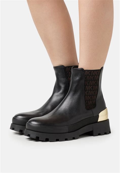 michael kors chase ankle boot black|Michael Kors adjustable buckle boots.